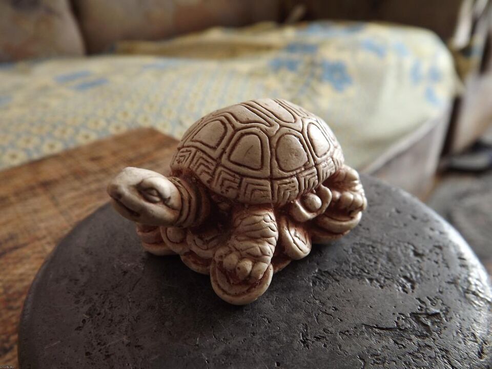 kilpikonnahahmo onnen amulettina